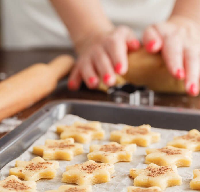 Baking cookies for Christmas. Cookies on baking sheet.