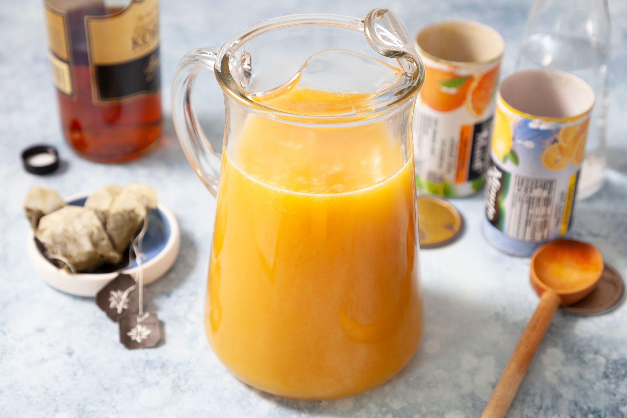 A Pitcher Full of Orange Juice and Brandy Mix