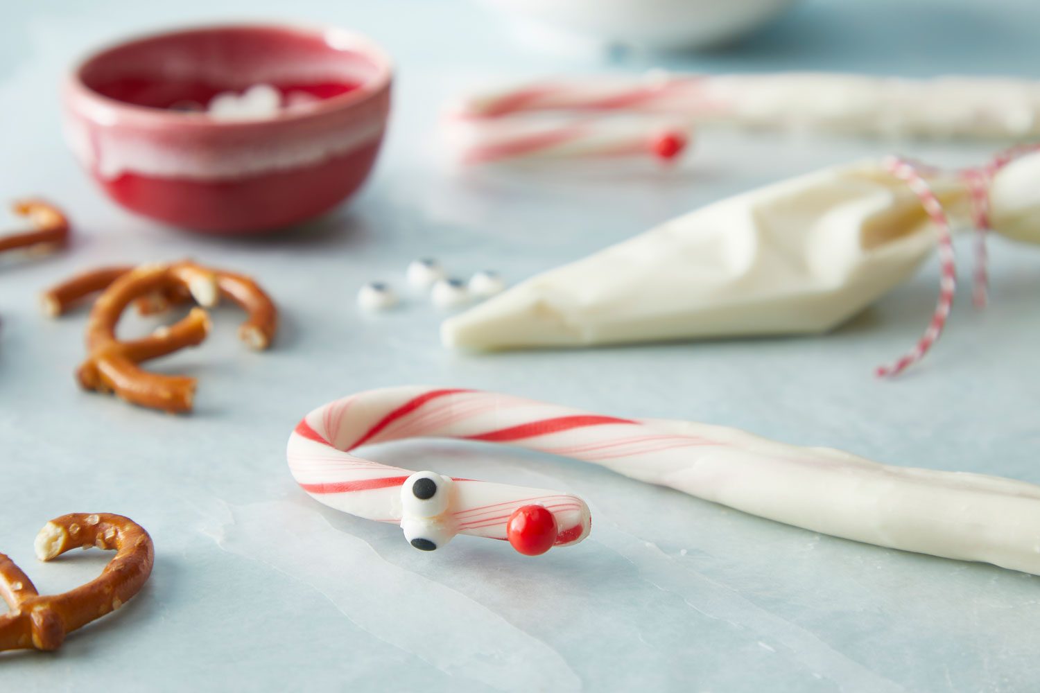 Candy Cane Reindeer close up on face with other supplies in the background