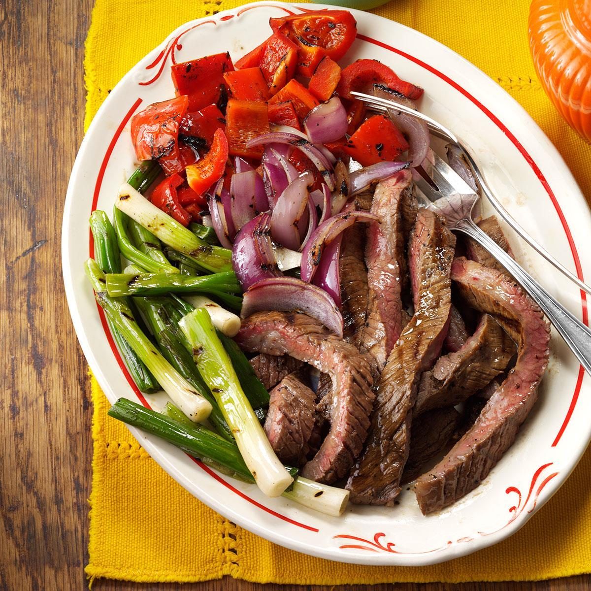 Grilled Skirt Steak with Red Peppers Onions