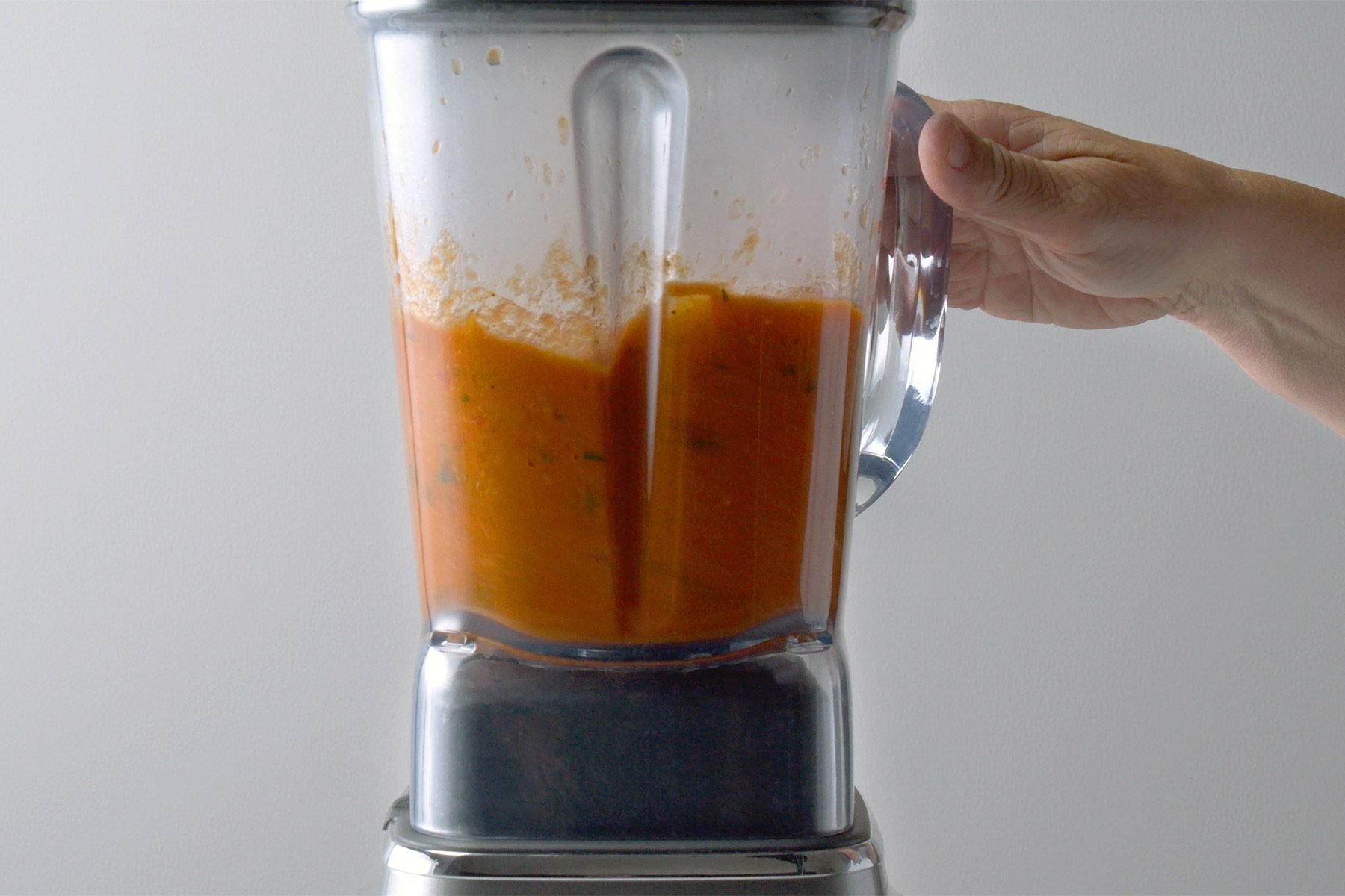 Transfer half of the soup mixture to a blender