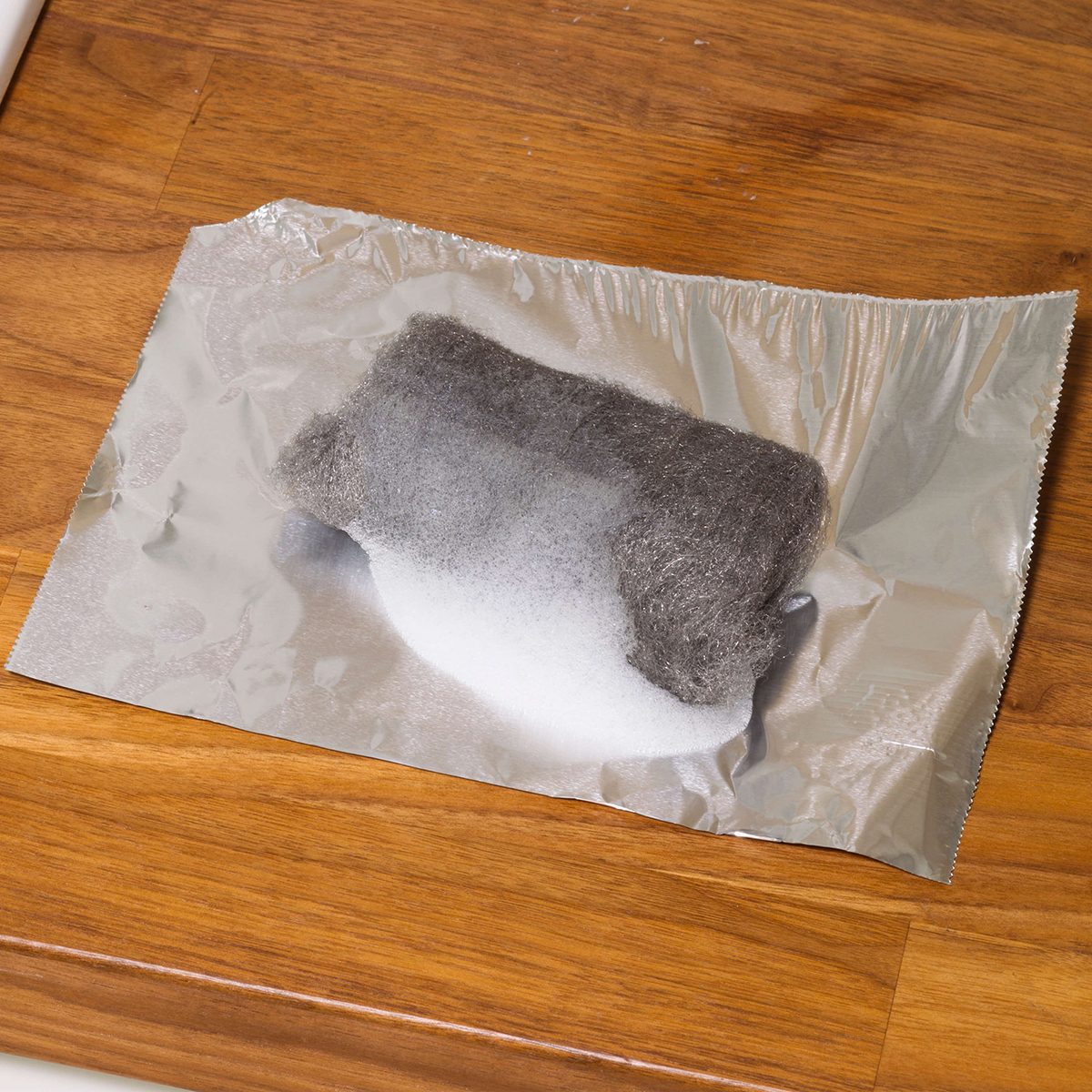 Steel wool on sheet of foil