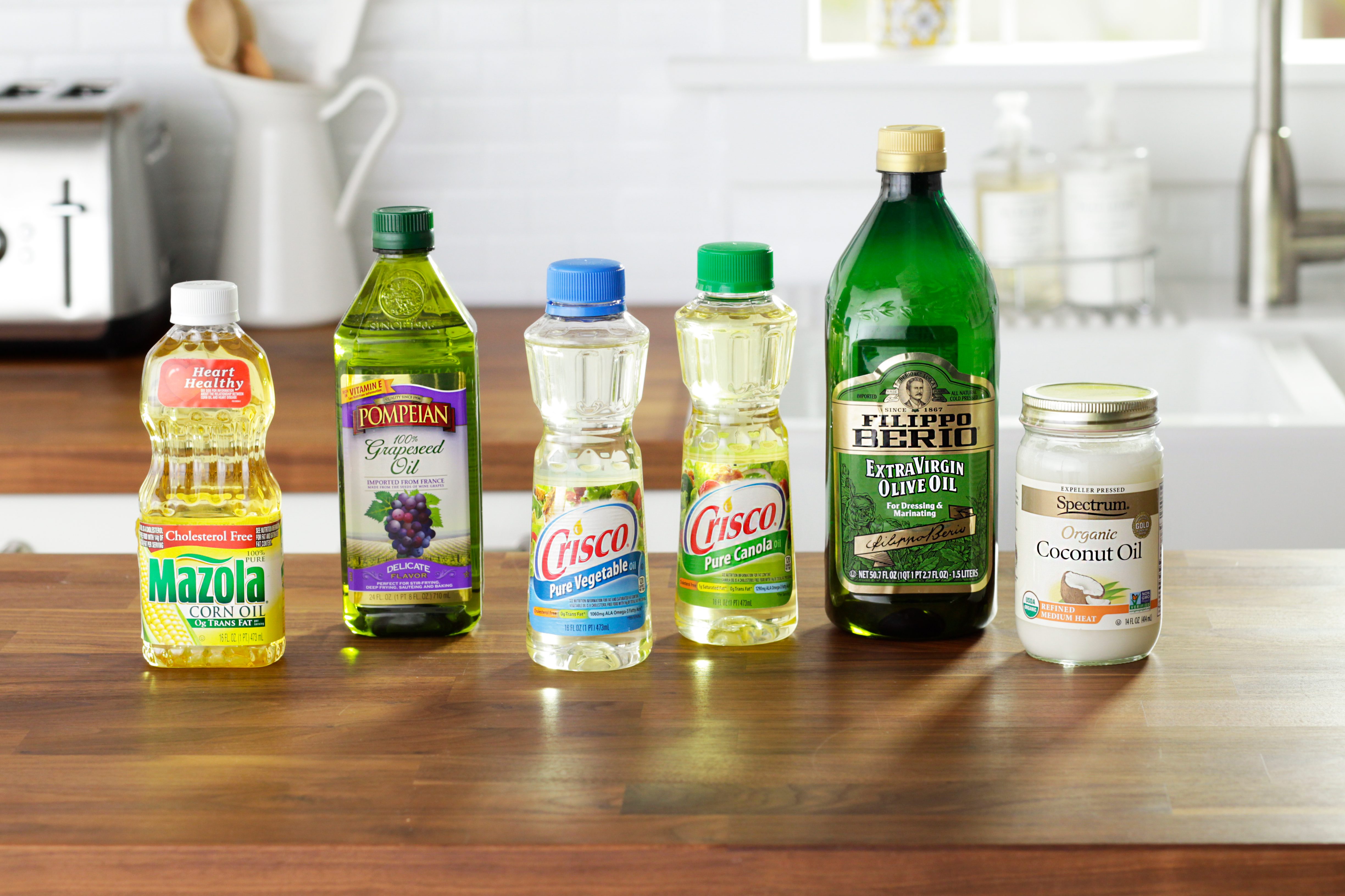 generic cooking oil bottles in kitchen environment