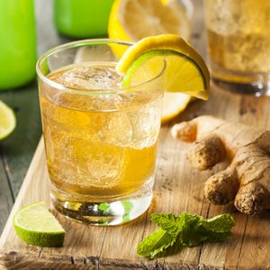 Organic Ginger Ale Soda in a Glass with Lemon and Lime