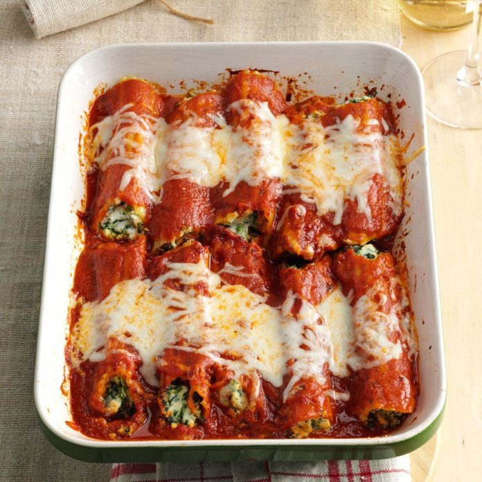 A pan of Spinach Manicotti with cheese