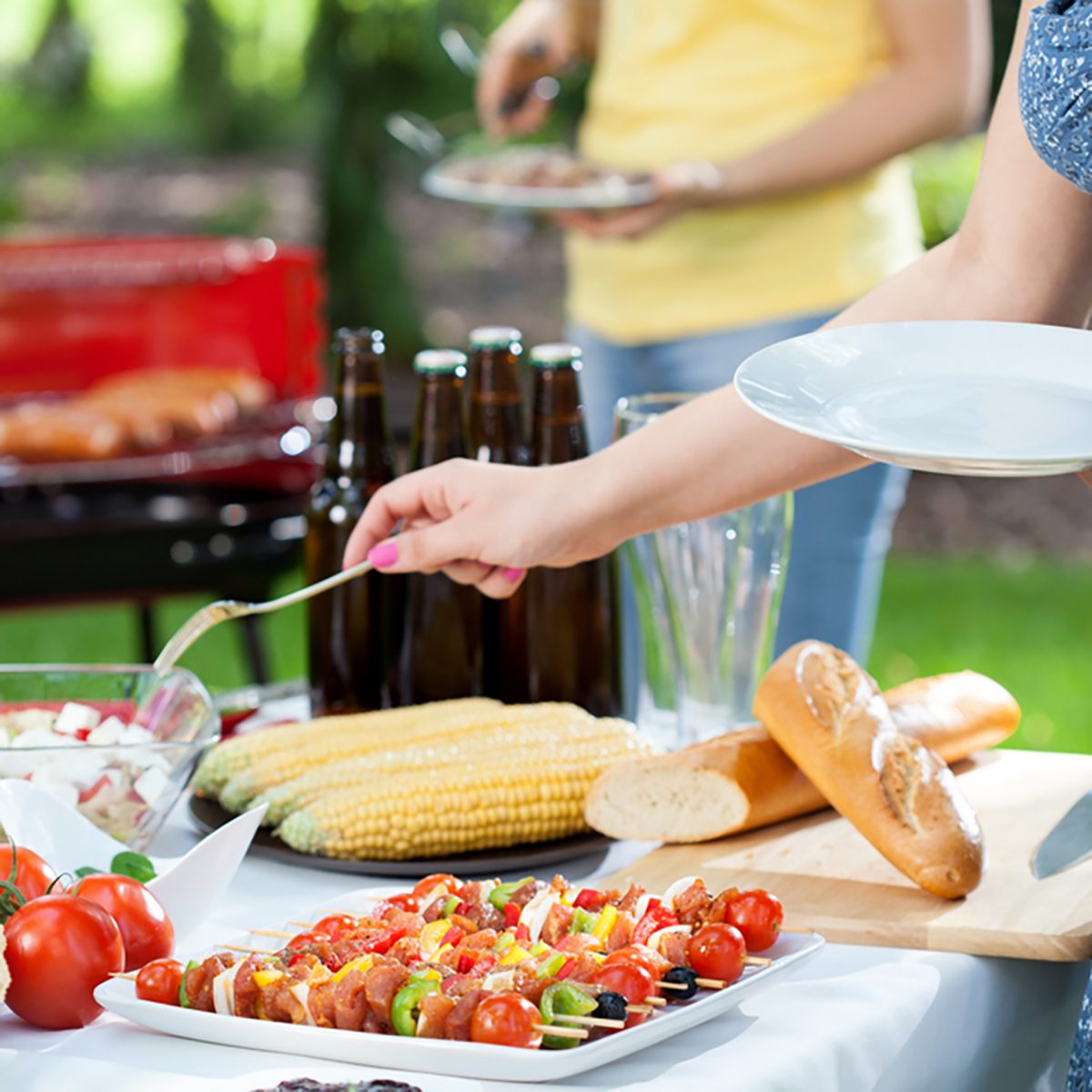 Horizontal view of friends during garden party