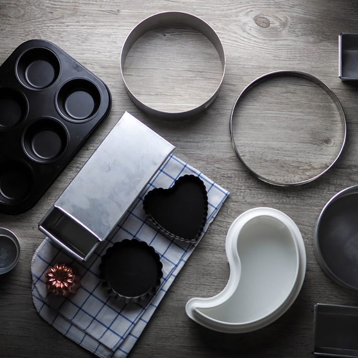 Bakeware (bakery tools) on wood table.