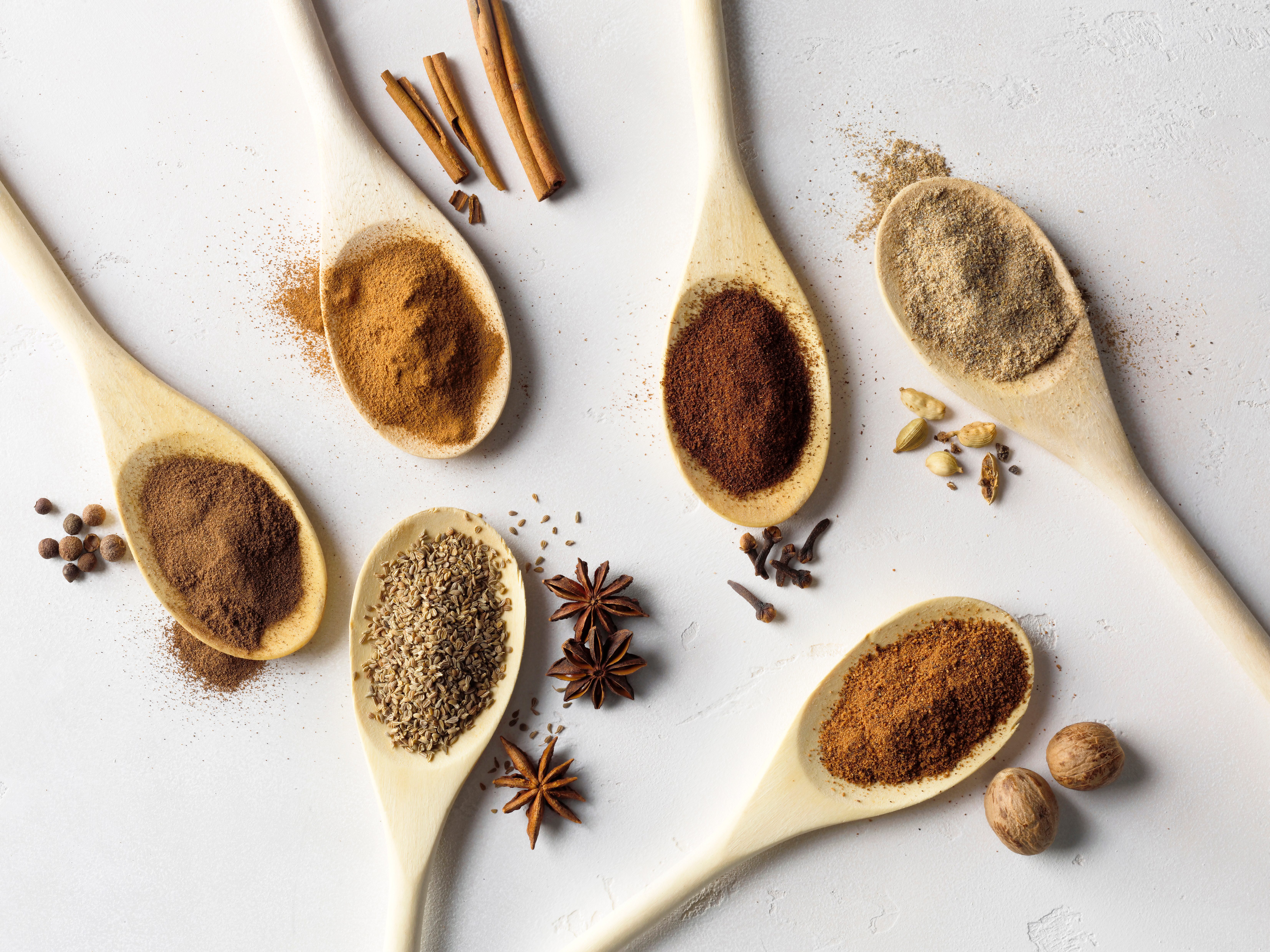 Spoonfuls of allspice, star anise, cinnamon, cloves, nutmeg, cardamom