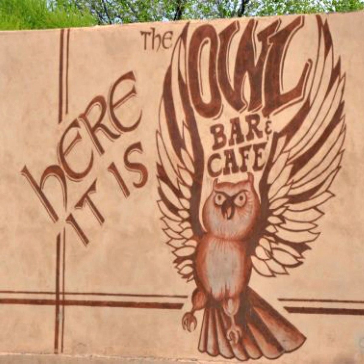 Sign for the Owl Bar and Cafe