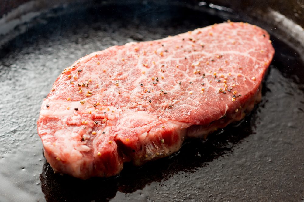 Why a Cast-Iron Skillet on the Grill Is the Key to Great Steak