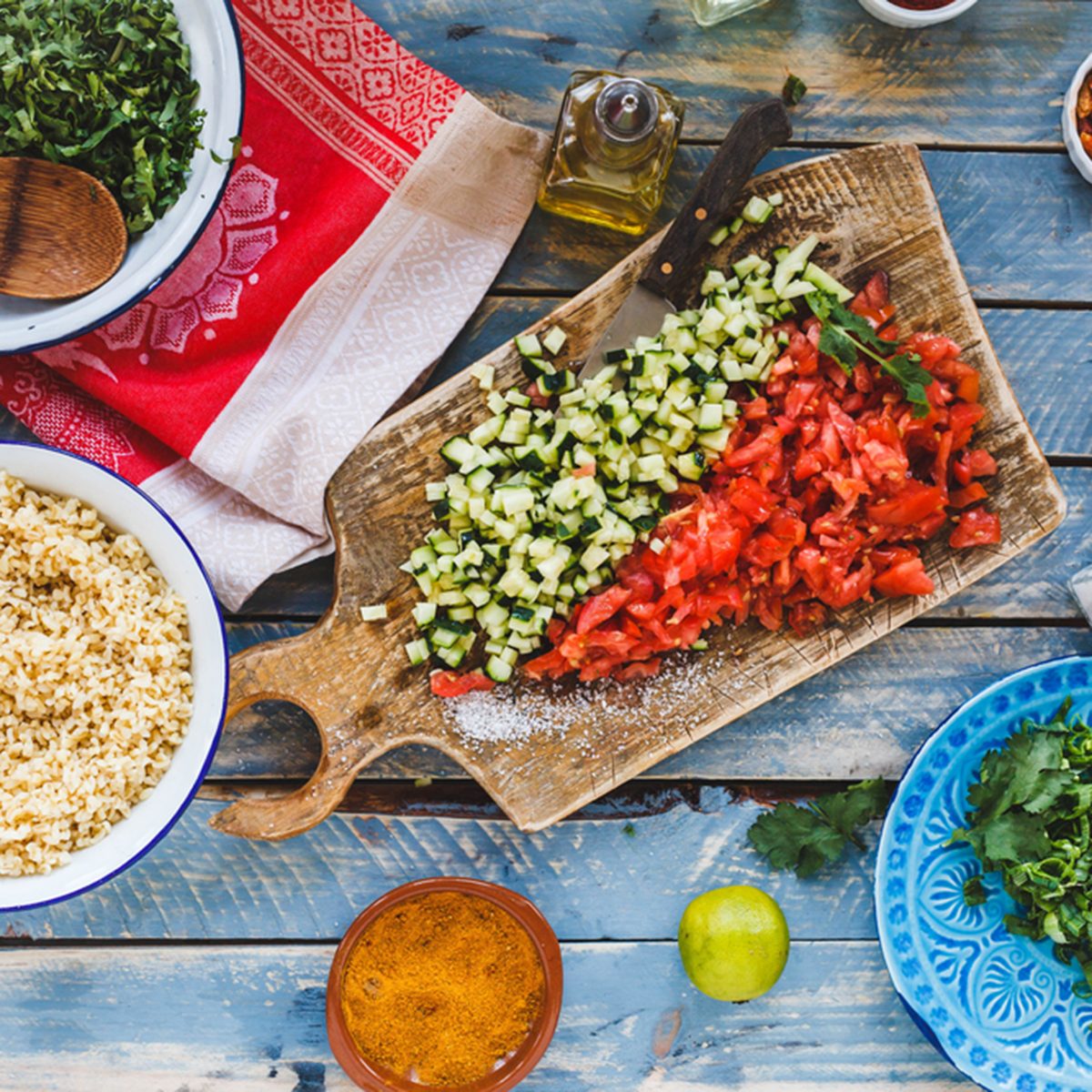 Cut Vegetables and bulgur grains ready to prepare salad. 