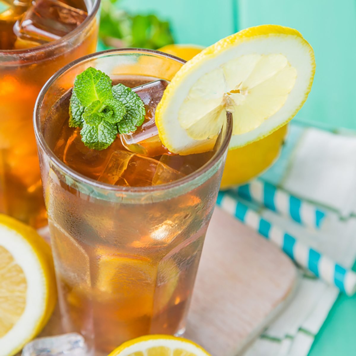 Iced tea in glasses, summer background copy space