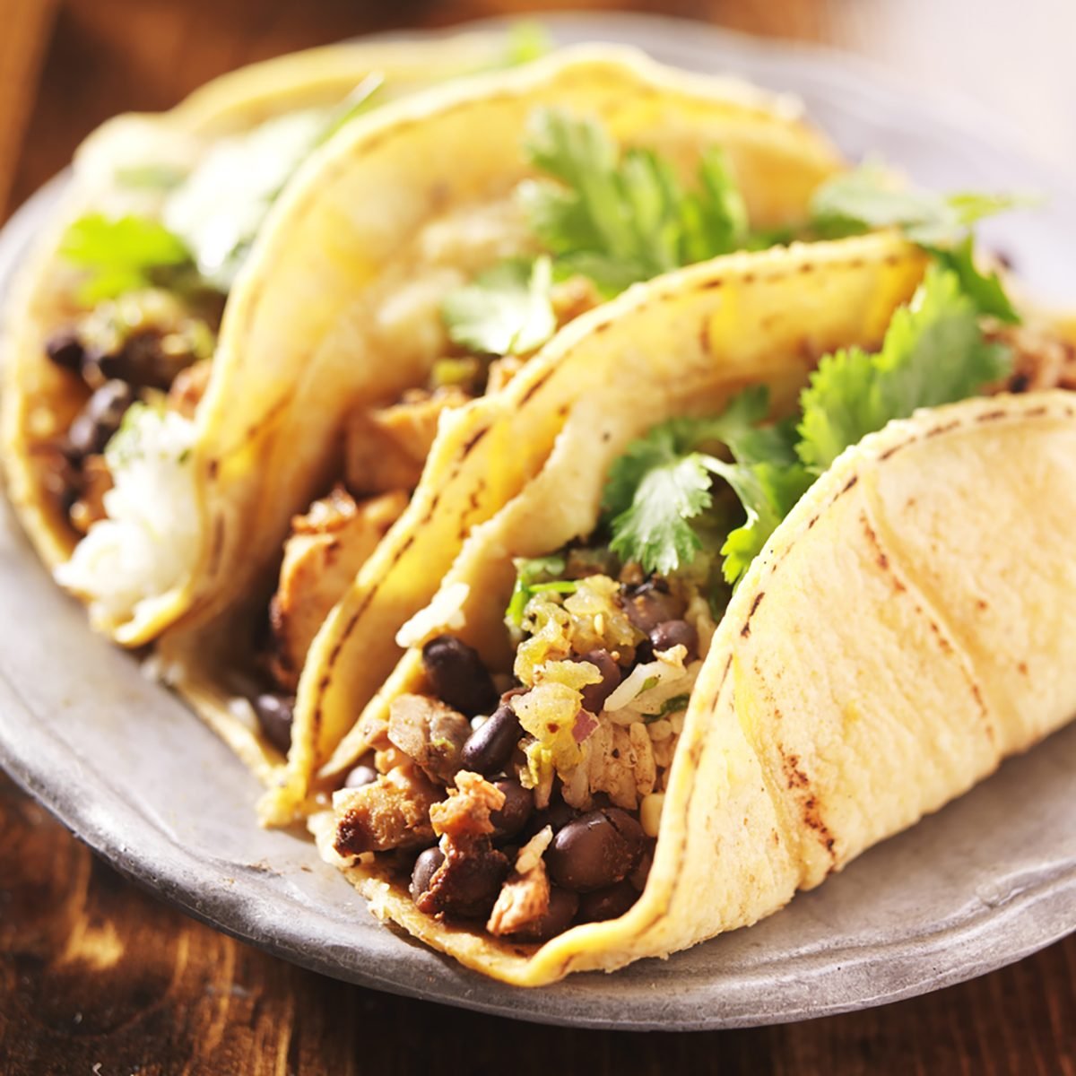 Tacos - in mexican yellow corn tortilla with chicken