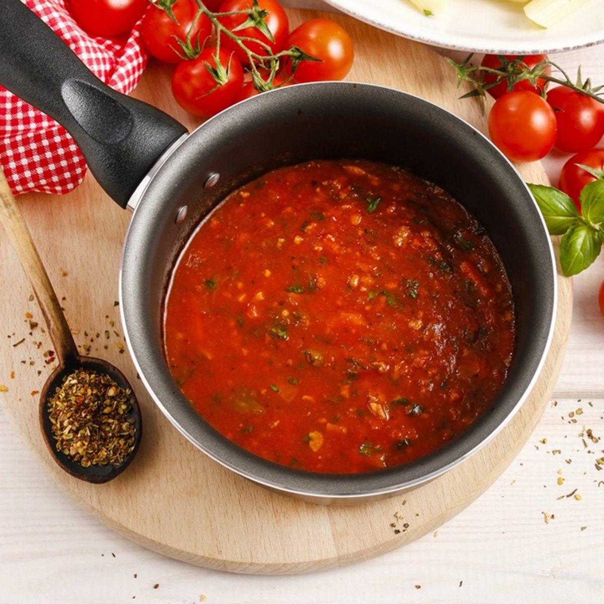 Red sauce made of dried tomatoes on frying pan.