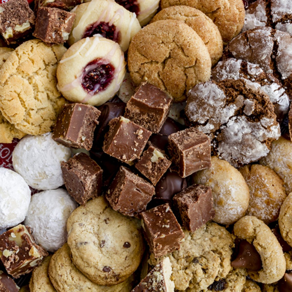 Holiday gift platter filled with homemade cookies and candies ready for gifting; Shutterstock ID 551370295