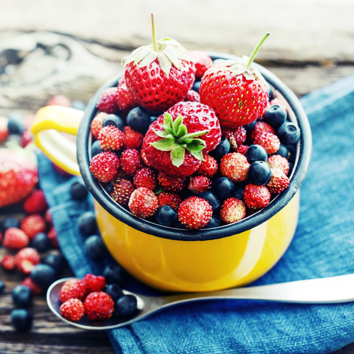 Berries on Wooden Background.