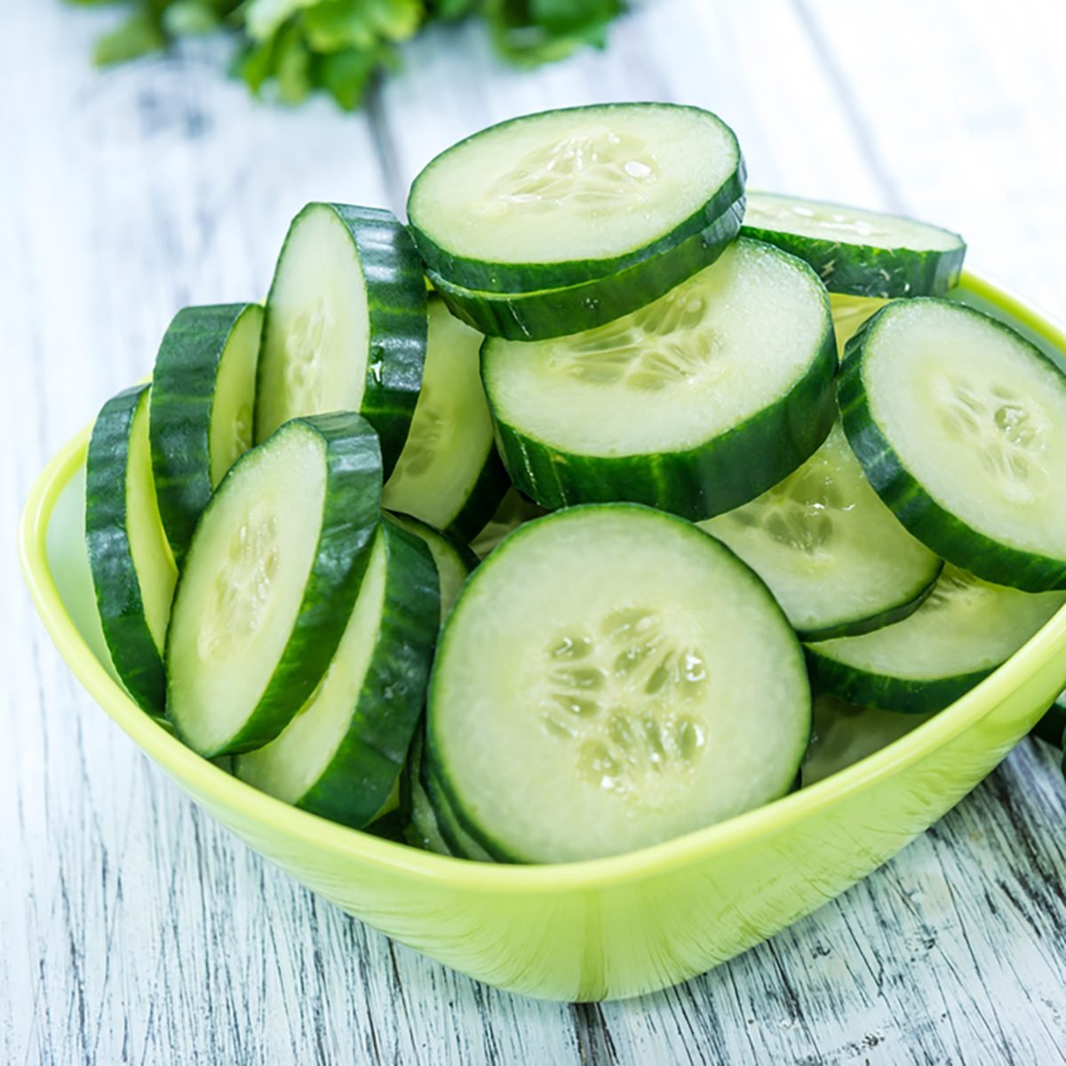 Portion of fresh and healthy Cucumbers (close-up shot)