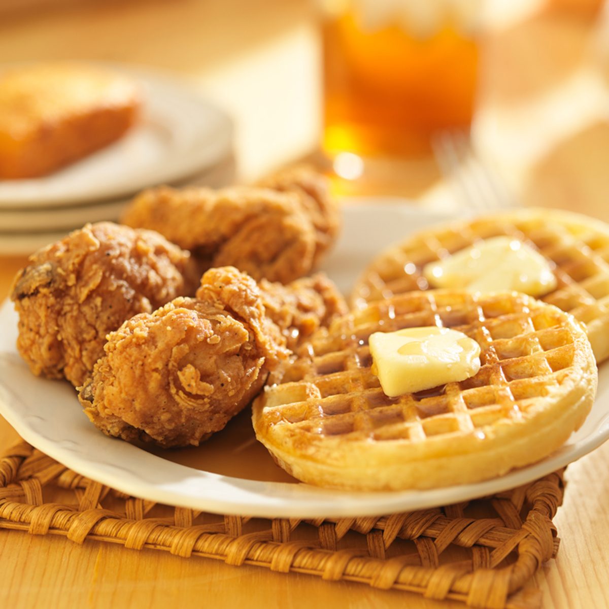 chicken and waffles with sweet tea in background; Shutterstock ID 206484388