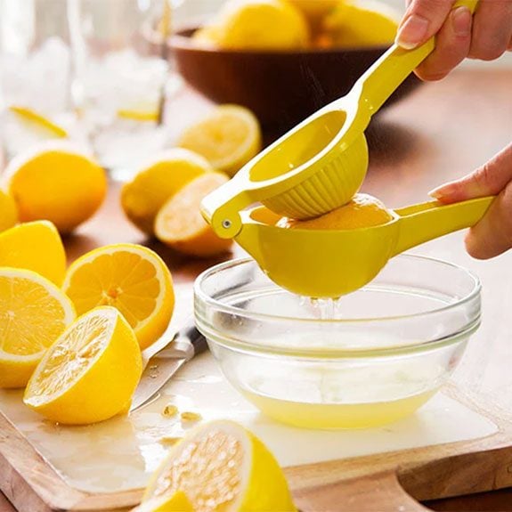 juicing a lemon half