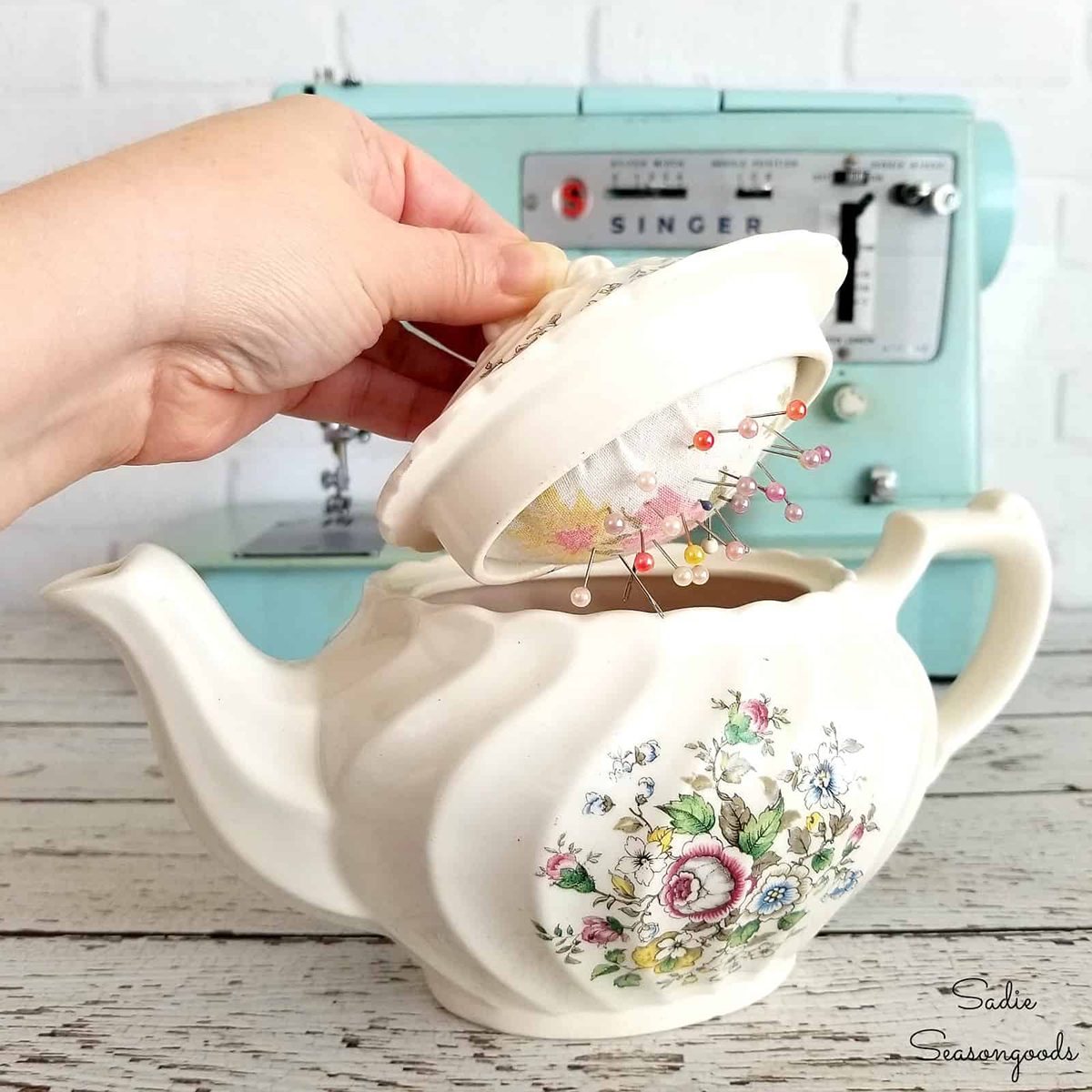 https://www.tasteofhome.com/wp-content/uploads/2019/04/How-to-upcycle-a-vintage-teapot-into-a-DIY-pincushion-and-sewing-kit-to-hide-pins-and-needles-by-Sadie-Seasongoods.jpg?fit=700%2C700