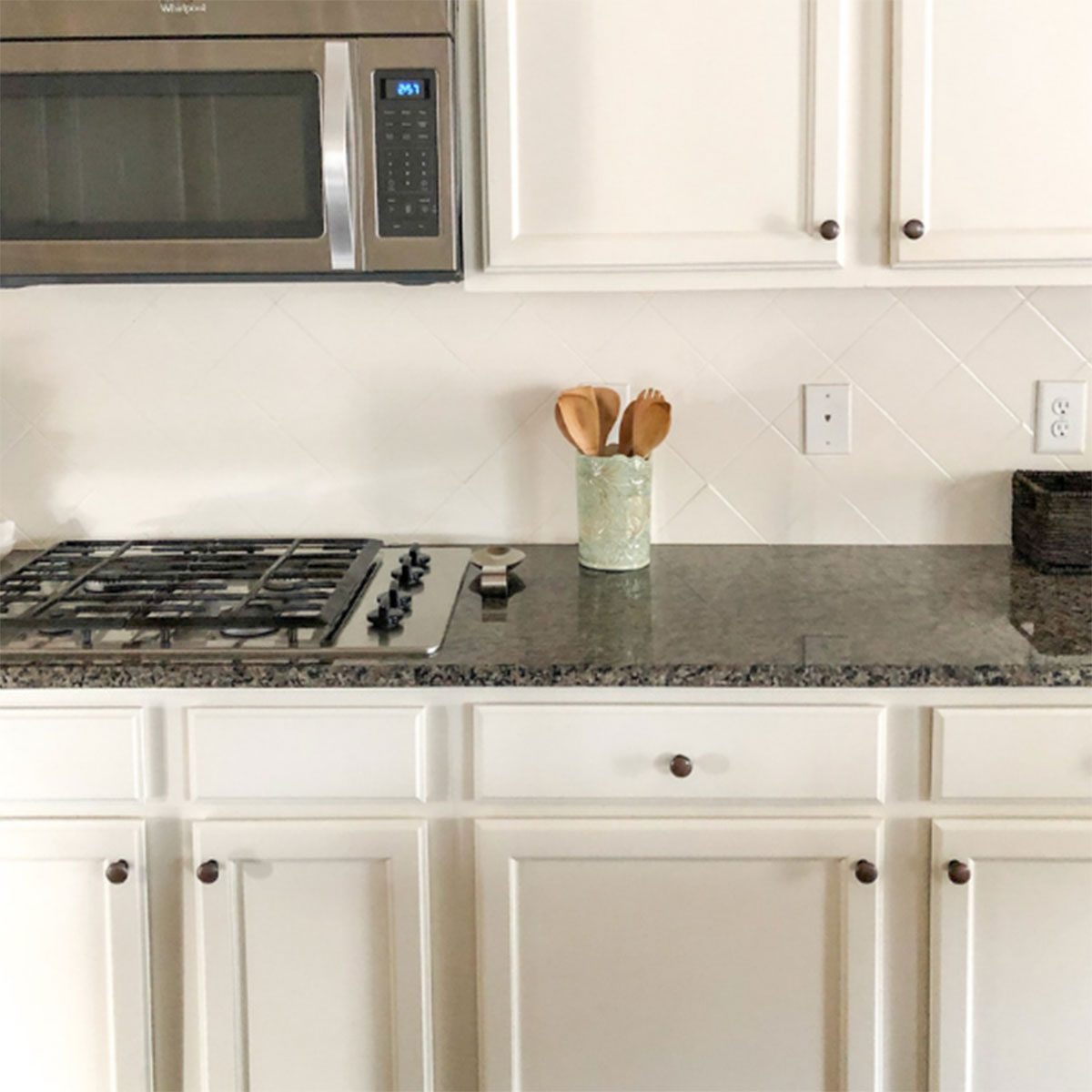 Painted tile backsplash