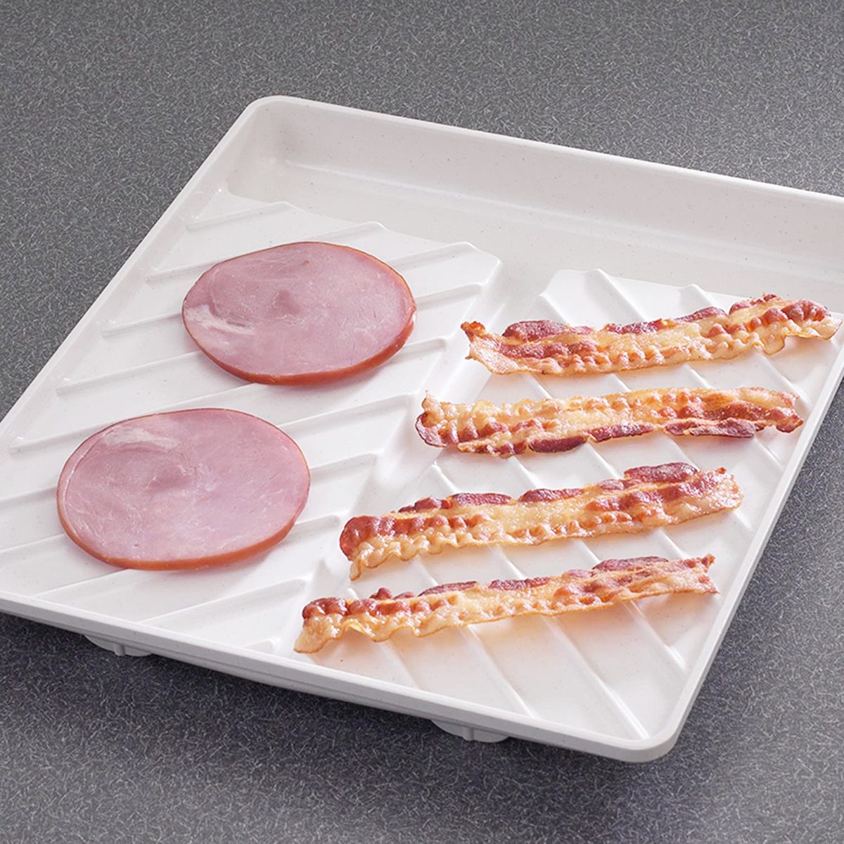 https://www.tasteofhome.com/wp-content/uploads/2019/05/microwave-bacon-tray-via-amazon.com-ecomm.jpg?fit=700%2C700
