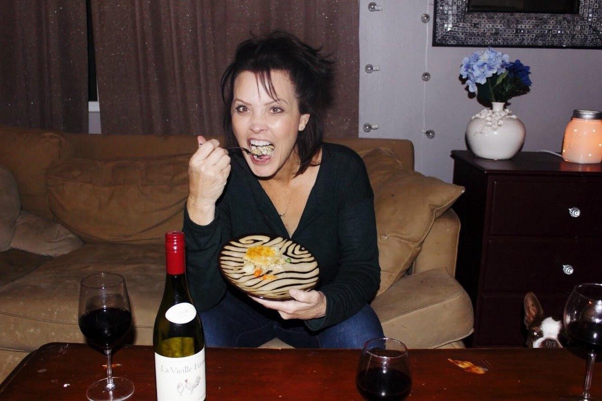 Woman eating chicken pot pie