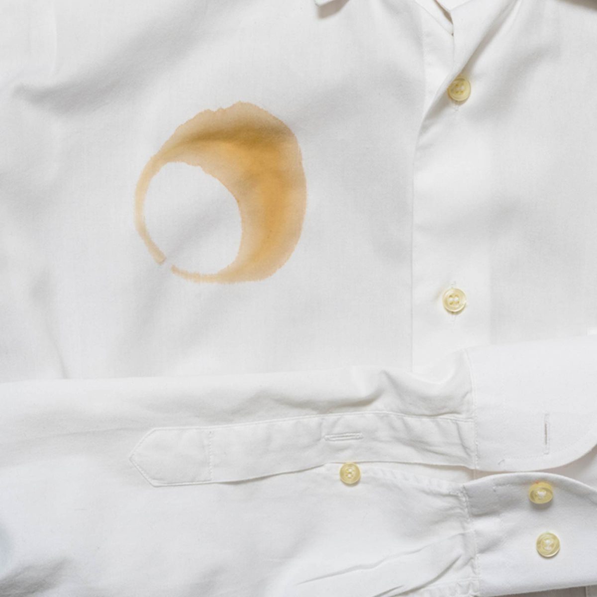 Coffee stain on white shirt