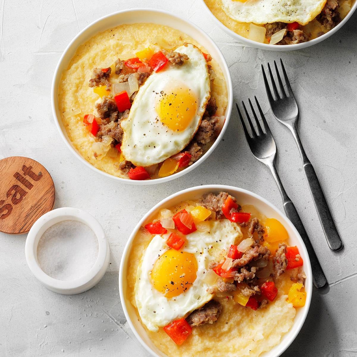 Sausage and Eggs over CheddarParmesan Grits Recipe Taste of Home