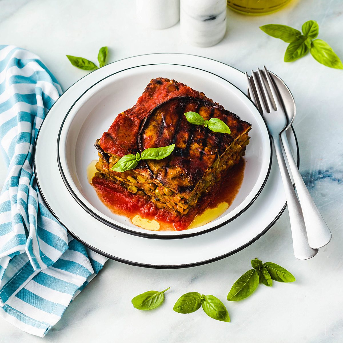 gluten free vegan lasagna. from grilled eggplant, green peas, lentils and vegetables. delicious healthy comfort food for the whole family for the holidays.