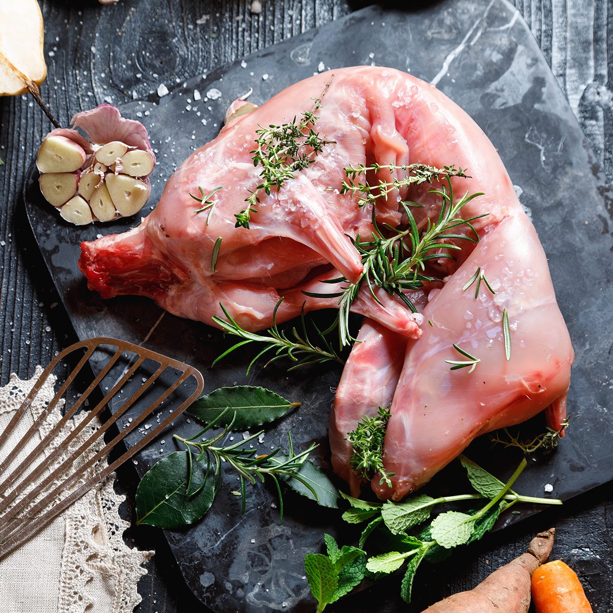 Raw meat on a stone slab