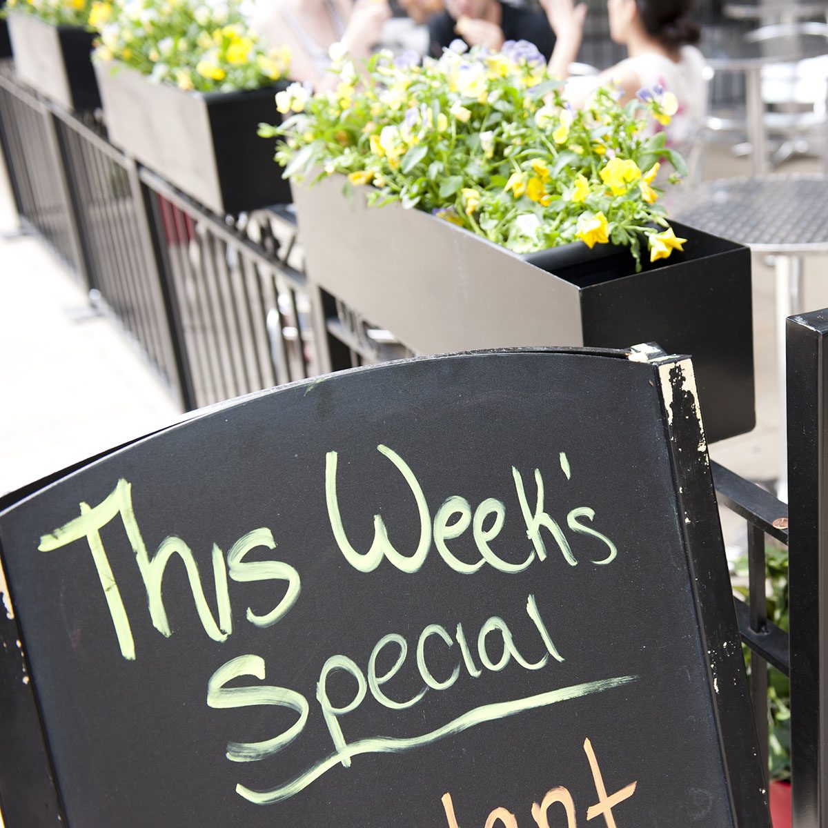 A blackboard in front of a cafe in Chicago, Illinois mentioning the special menu of the week.