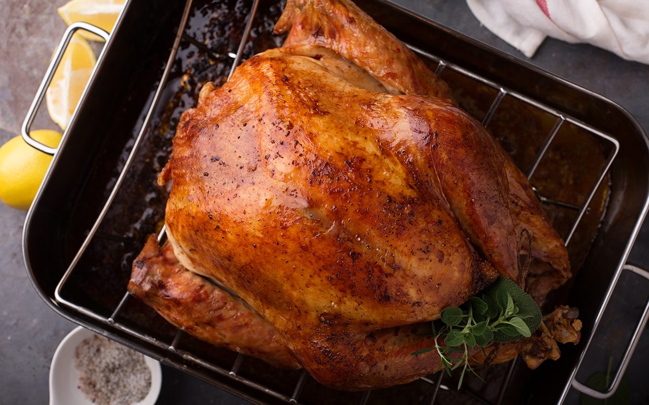 https://www.tasteofhome.com/wp-content/uploads/2019/08/cooked-turkey-for-thanksgiving-or-christmas-in-a-roasting-pan-shutterstock_737627782.jpg