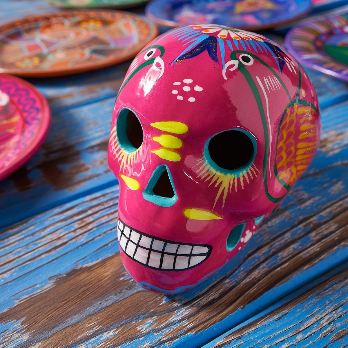 Mexican pink skull dia muertos crafts in Mexico of deaths day
