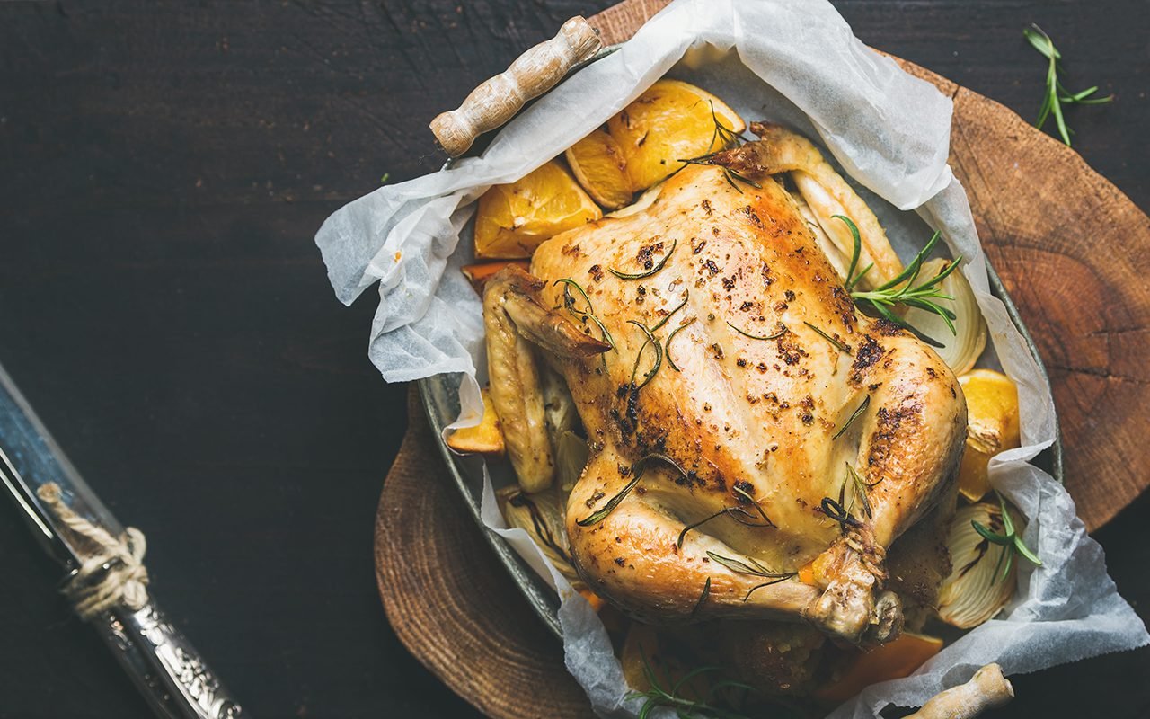 https://www.tasteofhome.com/wp-content/uploads/2019/08/roasted-whole-chicken-stuffed-with-oranges-bulgur-and-rosemary-shutterstock_544788838.jpg