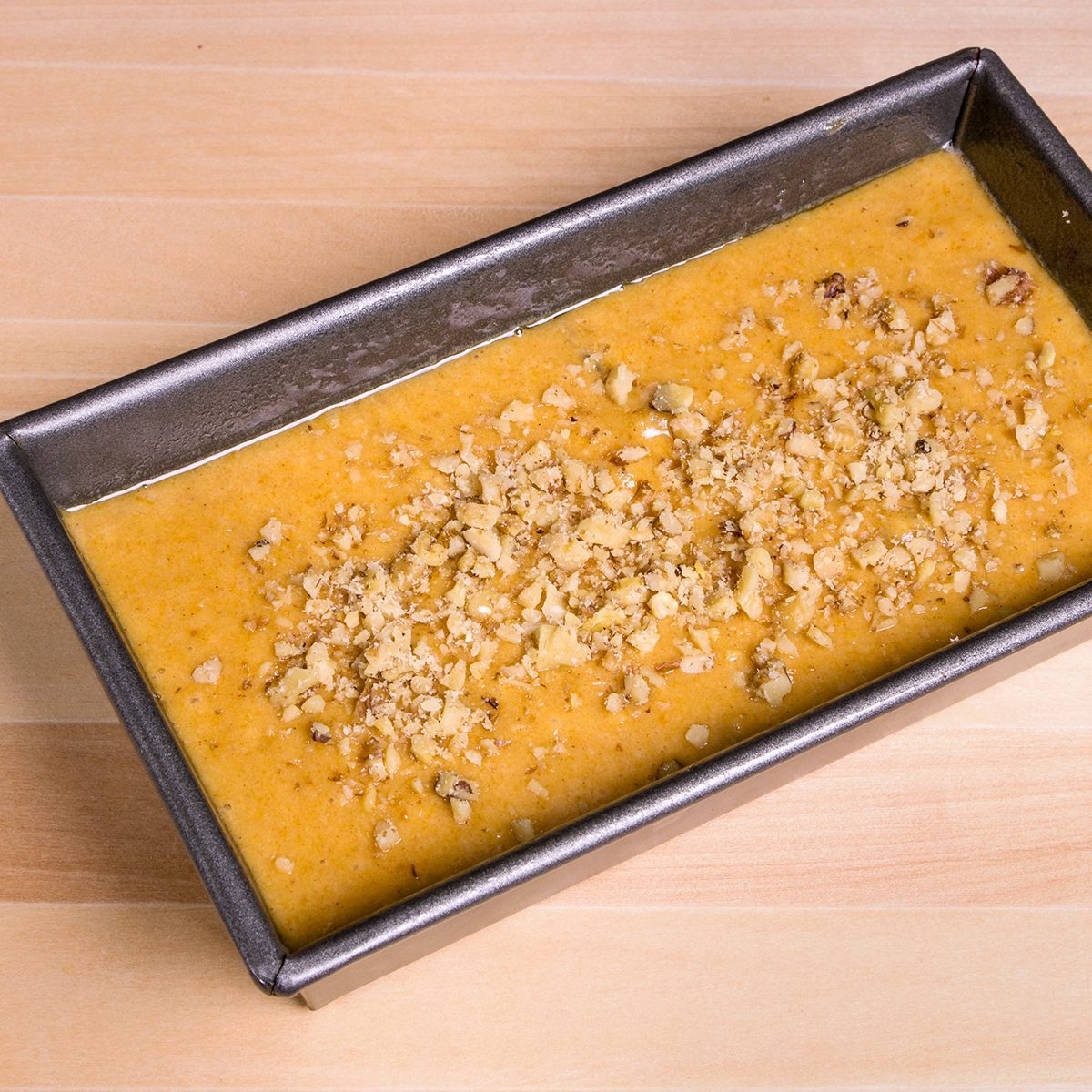 Pumpkin bread batter in a loaf pan ready for the oven; Shutterstock ID 130220897; Job (TFH, TOH, RD, BNB, CWM, CM): TOH