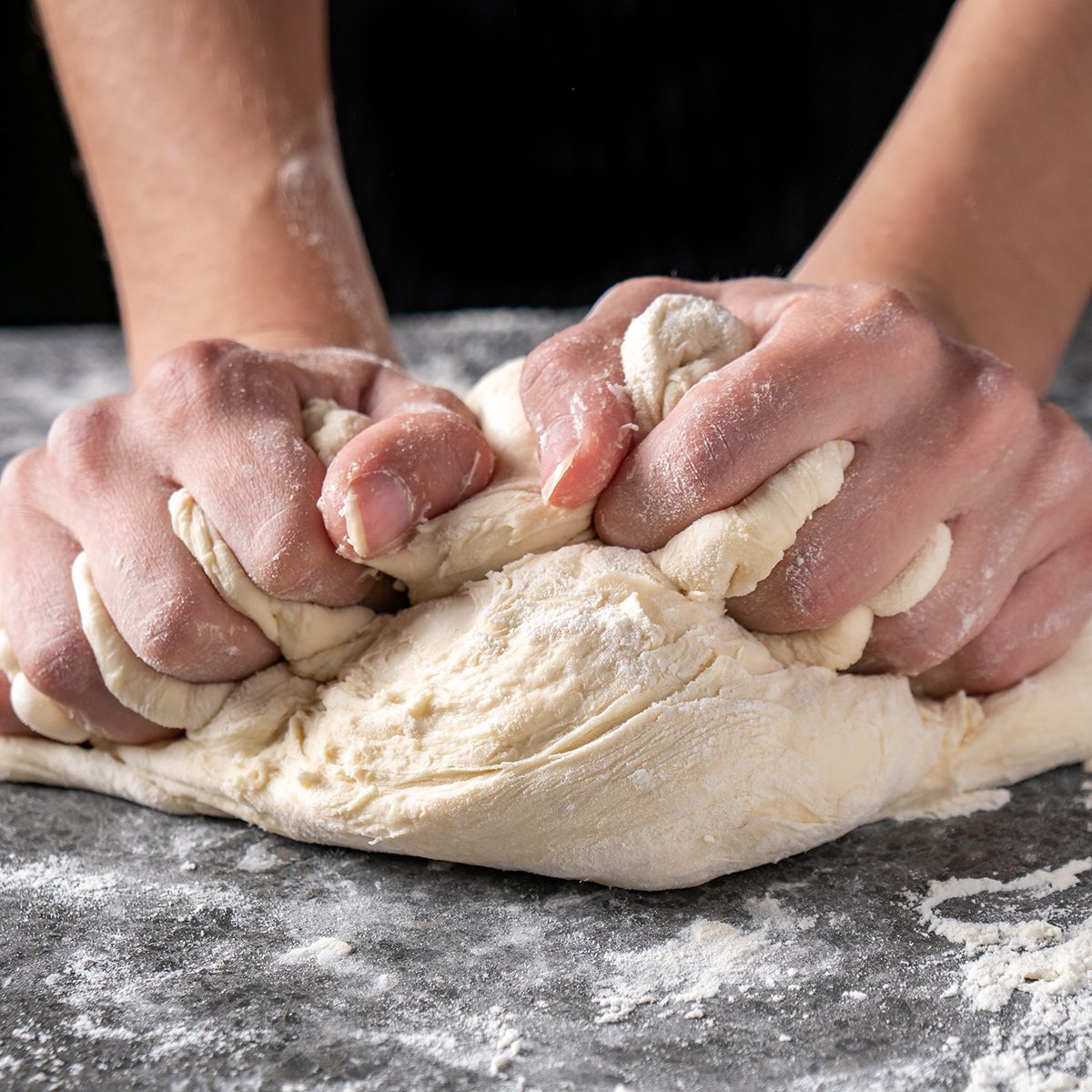 Making dough by female hands at bakery, Production of flour products; Shutterstock ID 1362120584; Job (TFH, TOH, RD, BNB, CWM, CM): Taste of Home