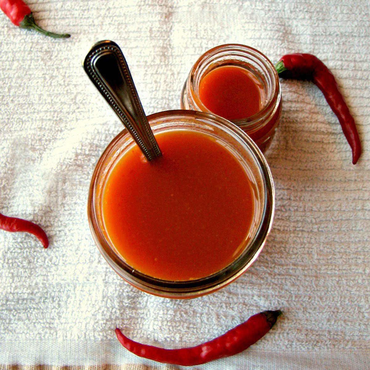 https://www.tasteofhome.com/wp-content/uploads/2019/09/Homemade-Cayenne-Pepper-Sauce-Overhead.jpg