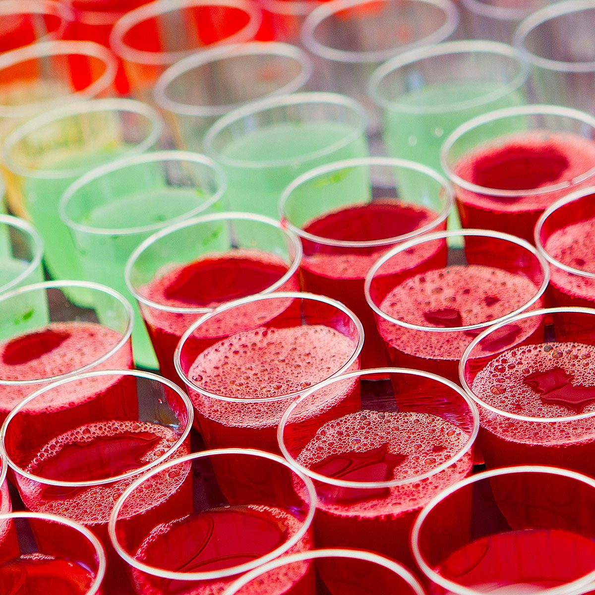 fruit drinks in decanters and glasses