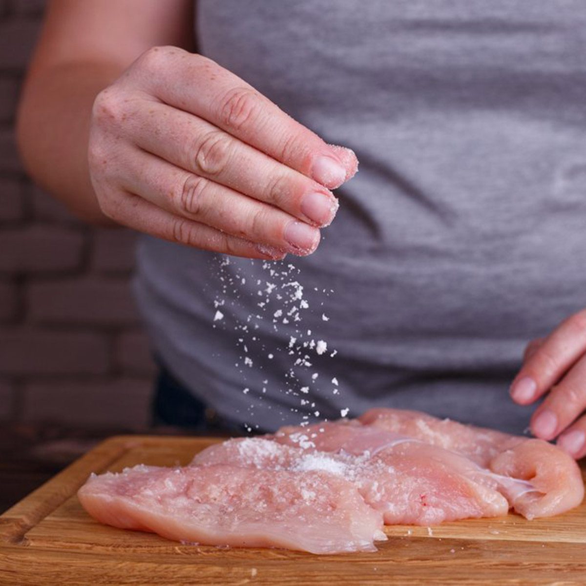 Adding salt to raw meat