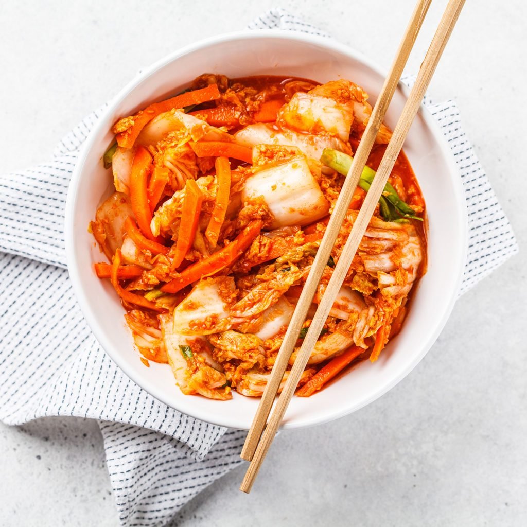 Kimchi cabbage, white background, top view. Korean food, probiotics food.; Shutterstock ID 1315267994; Job (TFH, TOH, RD, BNB, CWM, CM): Taste of Home