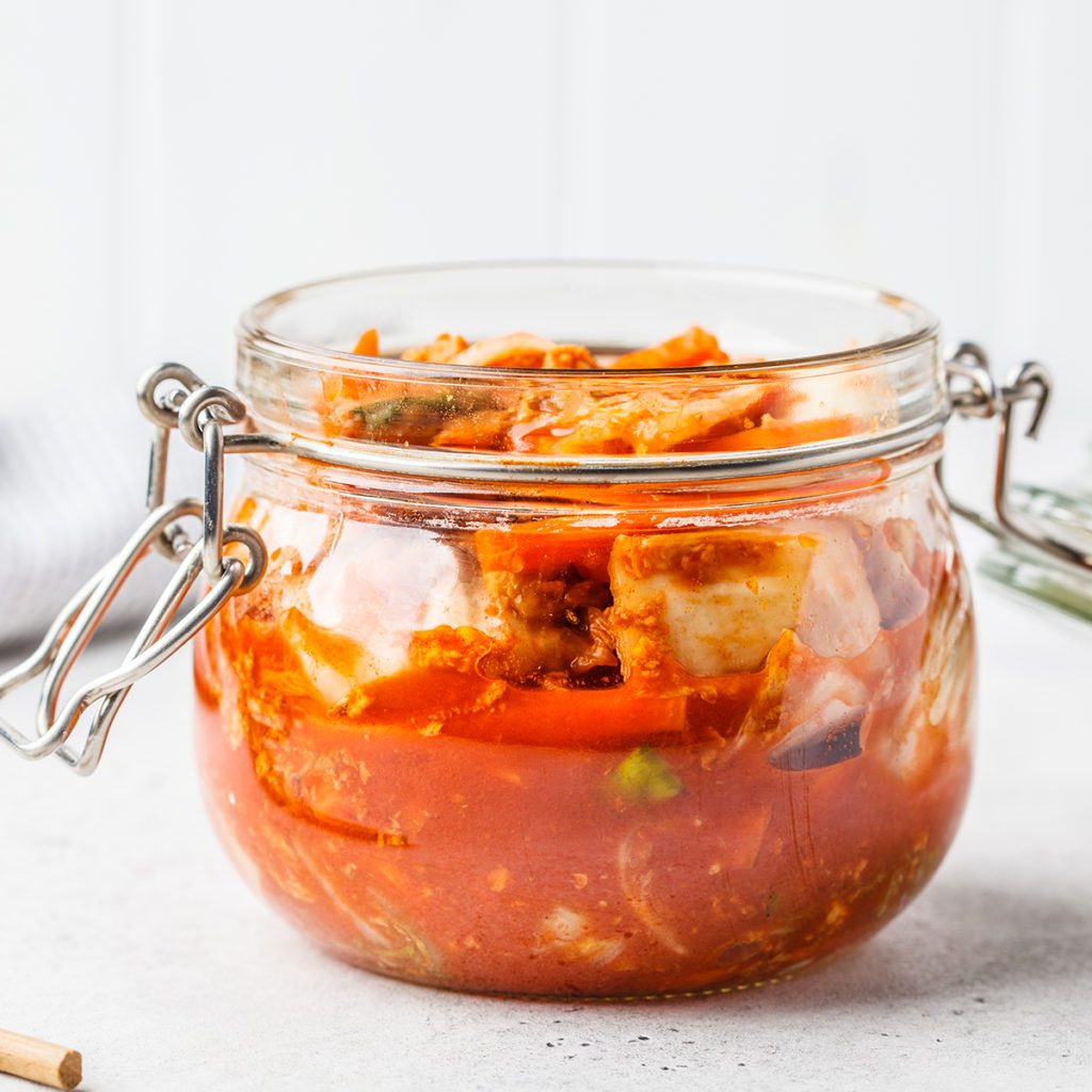 Kimchi cabbage, white background, top view. Korean food, probiotics food.; Shutterstock ID 1320880211; Job (TFH, TOH, RD, BNB, CWM, CM): Taste of Home