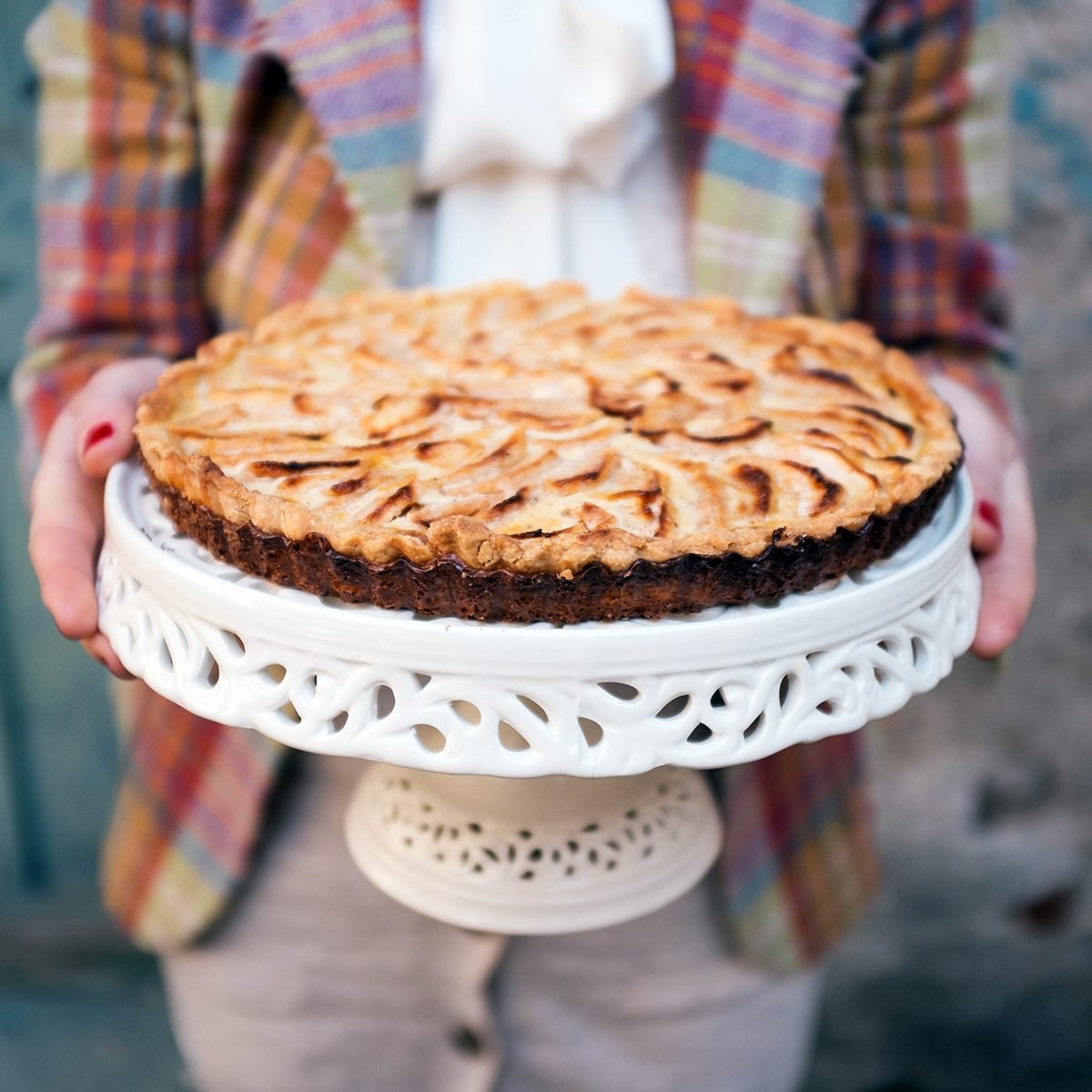 Person offering a dessert