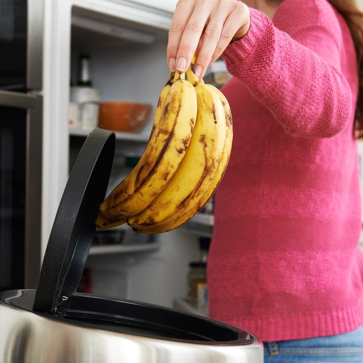 Woman Throwing Away Out Of Date Food In Refrigerator; Shutterstock ID 361486037; Job (TFH, TOH, RD, BNB, CWM, CM): TOH