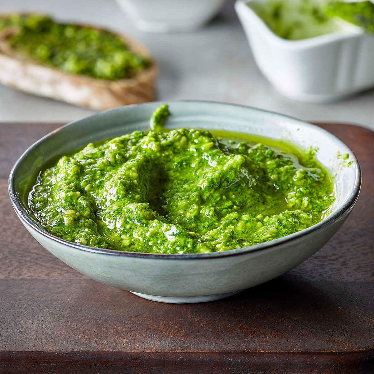 bowl of basil pesto, selective focus