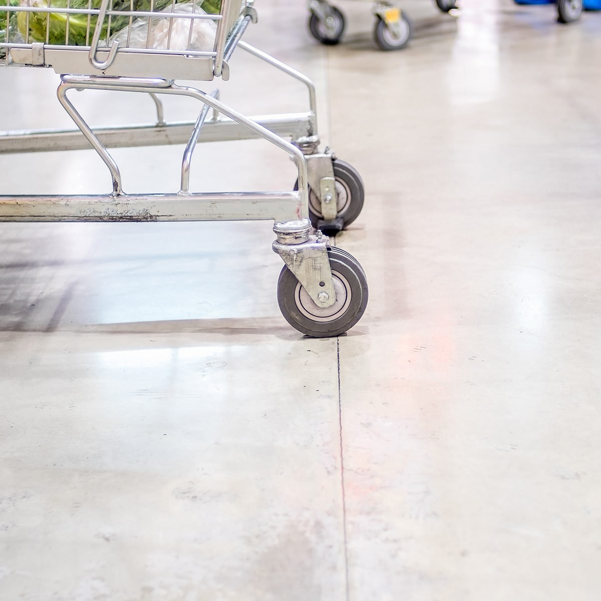 Cart wheels rolling along the floor