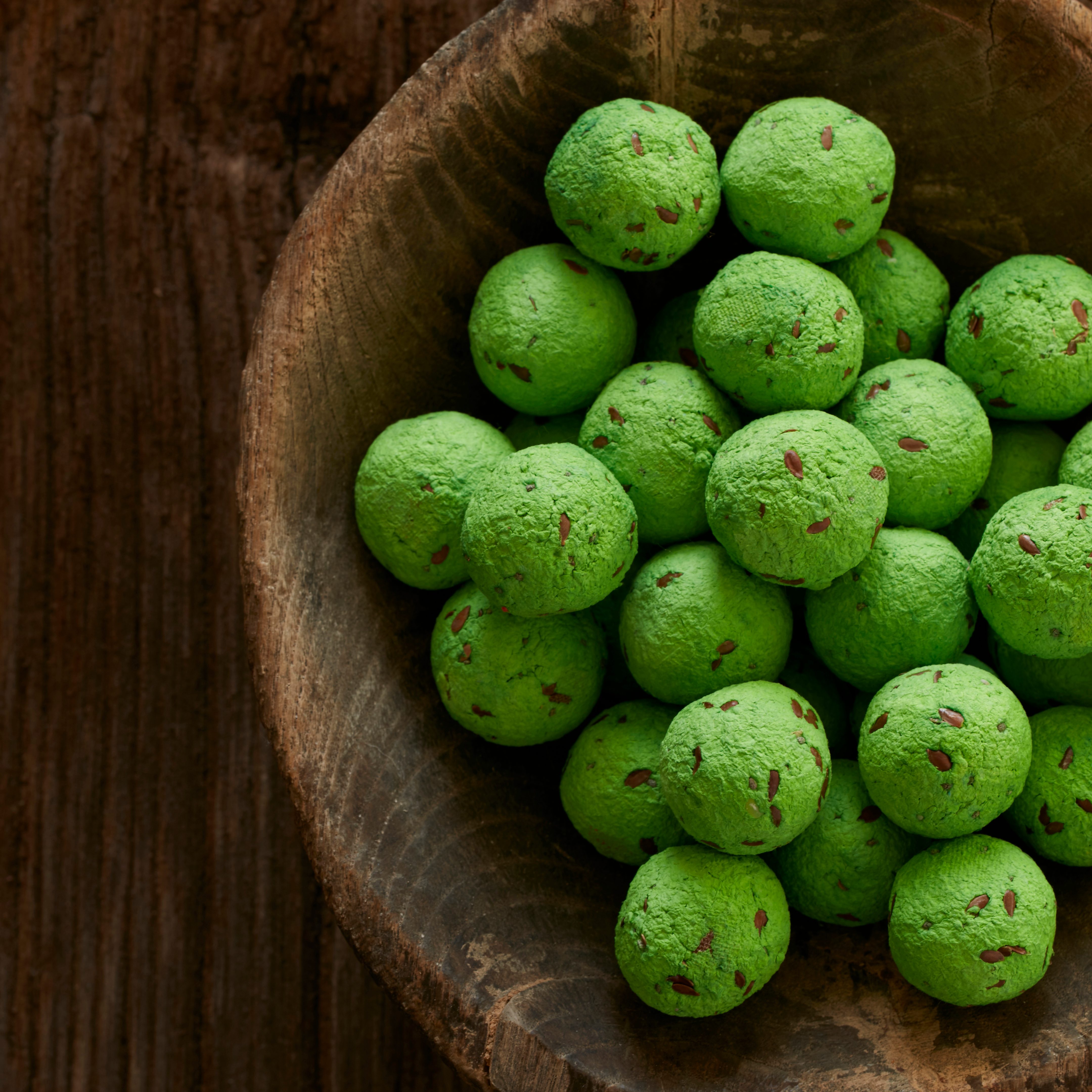 Green Seed Bombs in a bowl