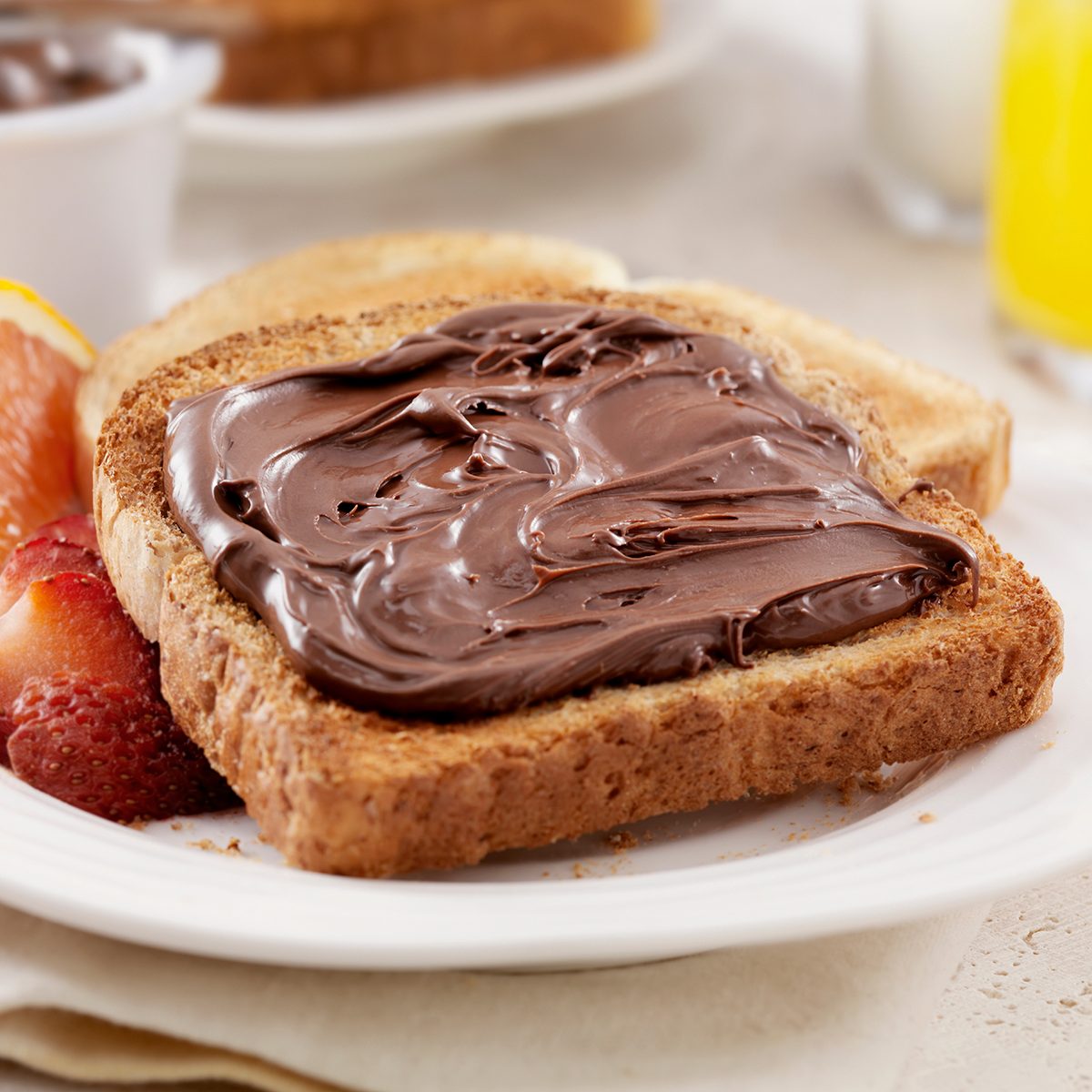 Chocolate Hazelnut Spread on Toast with Fresh Fruit- Photographed on Hasselblad H3D2-39mb Camera