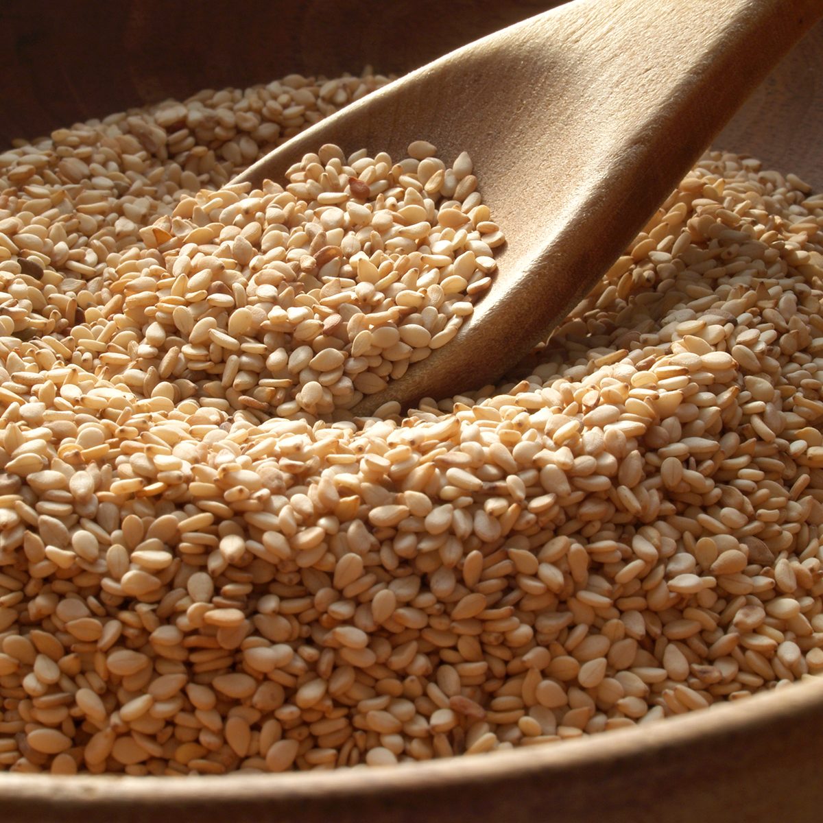 Wooden bowl of sesame seeds