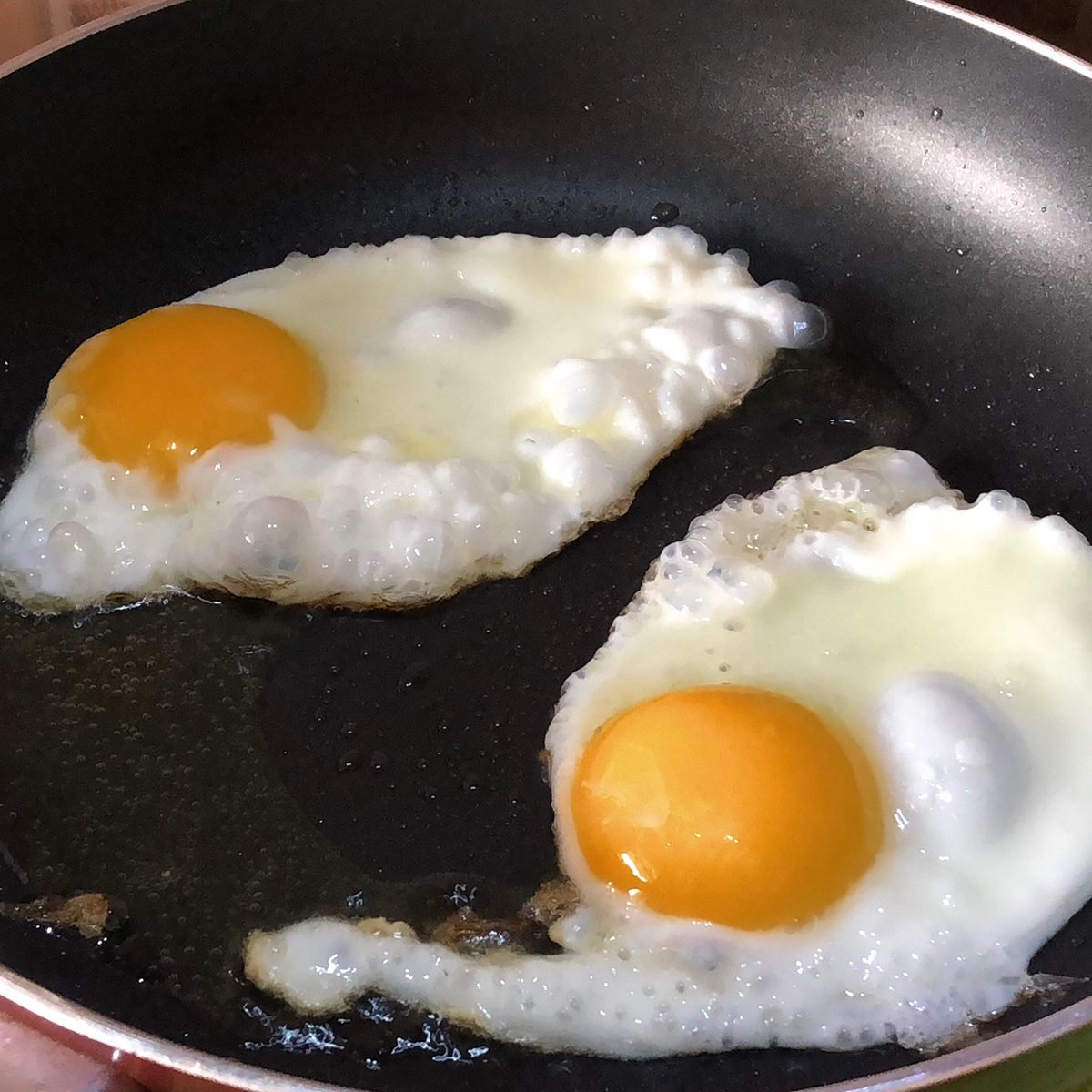https://www.tasteofhome.com/wp-content/uploads/2020/02/image-of-fried-eggs-cooking-in-non-stick-frying-pan-GettyImages-1090436260.jpg?fit=700%2C700